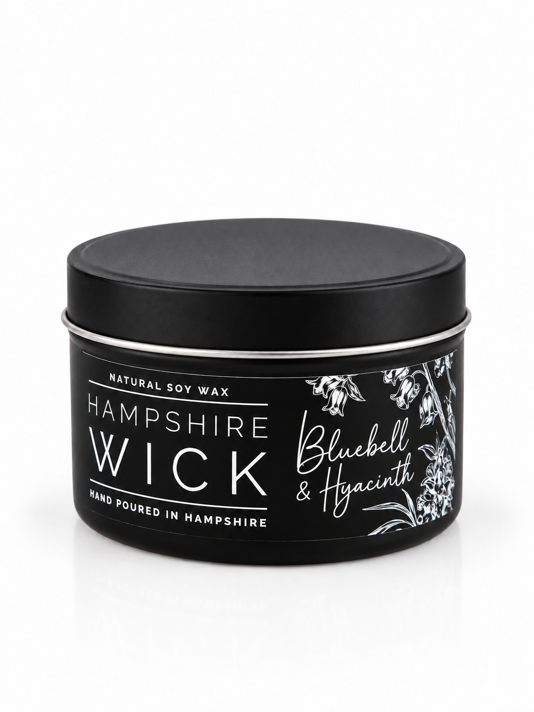 A black tin of Hampshire Wick natural soy wax, scented as Bluebell & Hyacinth, on a clean white background.
