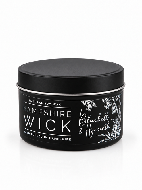 A black tin of Hampshire Wick natural soy wax, scented as Bluebell & Hyacinth, on a clean white background.